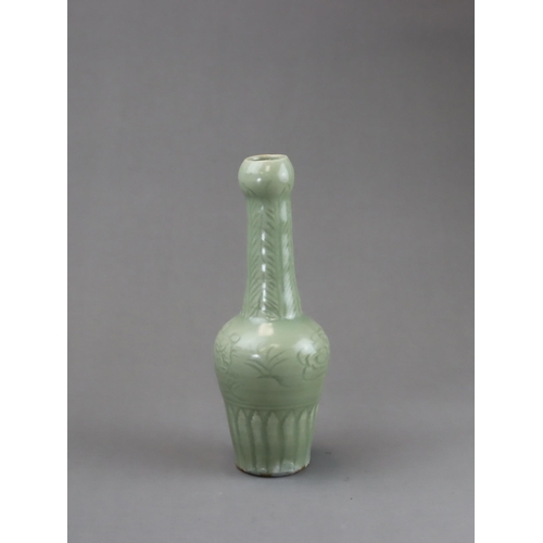 27 - A Rare Longquan Celadon Carved 'Tiger' Vase, Yuan dynasty of slender baluster form rising to the tal... 