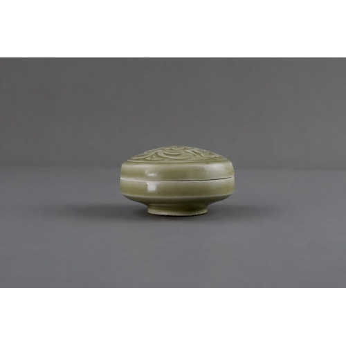 28 - A Fine Yaozhou Carved Celadon Box and Cover, Song dynasty of circular section, the box with low stra... 