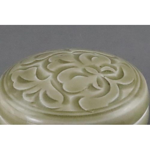 28 - A Fine Yaozhou Carved Celadon Box and Cover, Song dynasty of circular section, the box with low stra... 