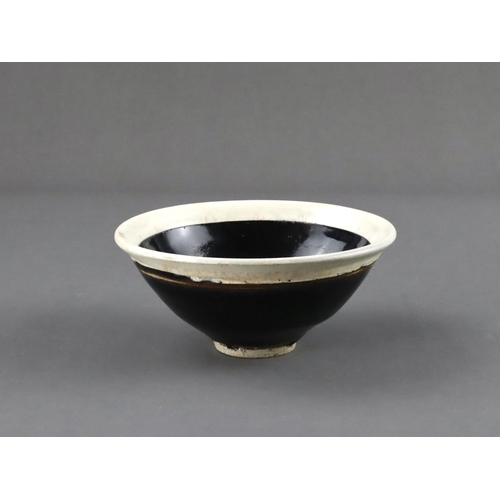 36 - A Fine White-rimmed Black-glazed conical Bowl, Song dynasty of conical form, covered overall with a ... 