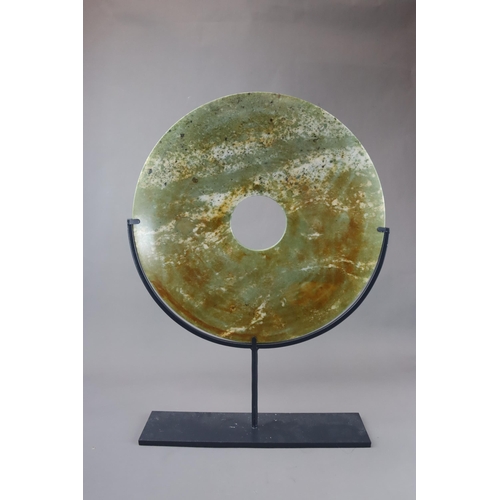 458 - A Grey Jade Â¡Â®biÂ¡Â¯ Disc, modern the smoothly finished stone disc mottled with darker markings, m... 