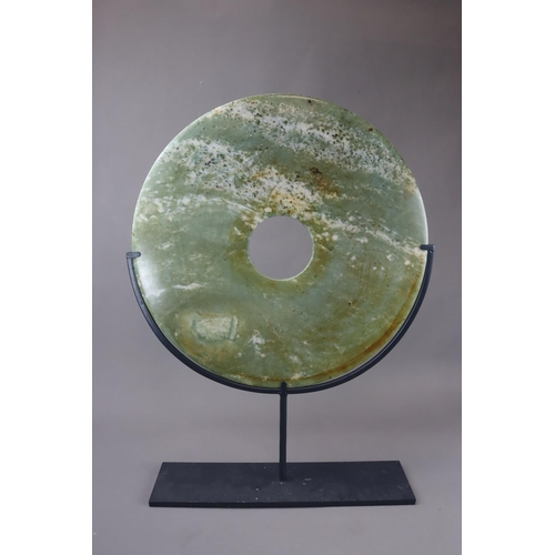 458 - A Grey Jade Â¡Â®biÂ¡Â¯ Disc, modern the smoothly finished stone disc mottled with darker markings, m... 