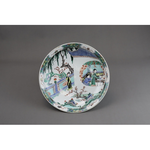 468 - A famille verte Saucer Dish with Figures, late Qing dynasty well painted in rich enamels with a moon... 