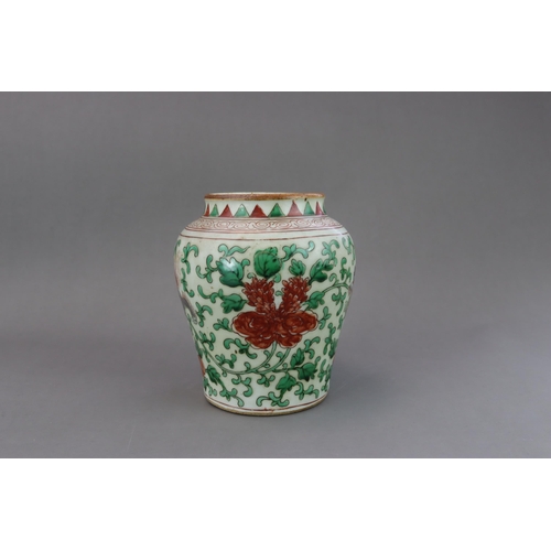 471 - A Wucai Jar with Lions, 19th/20th century, of baluster form, with unglazed base and short neck, the ... 