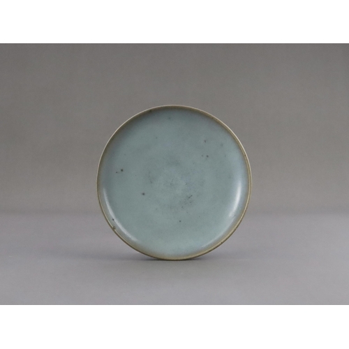 48 - A Jun Blue-glazed Dish, Jin dynasty the gently rounded sides rising from a short recessed foot, cove... 