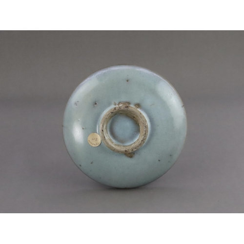 48 - A Jun Blue-glazed Dish, Jin dynasty the gently rounded sides rising from a short recessed foot, cove... 