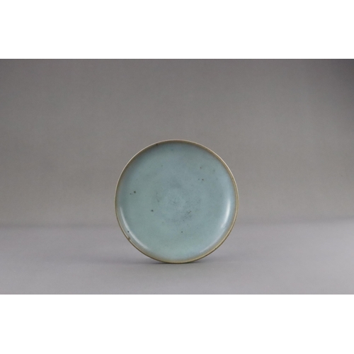 48 - A Jun Blue-glazed Dish, Jin dynasty the gently rounded sides rising from a short recessed foot, cove... 