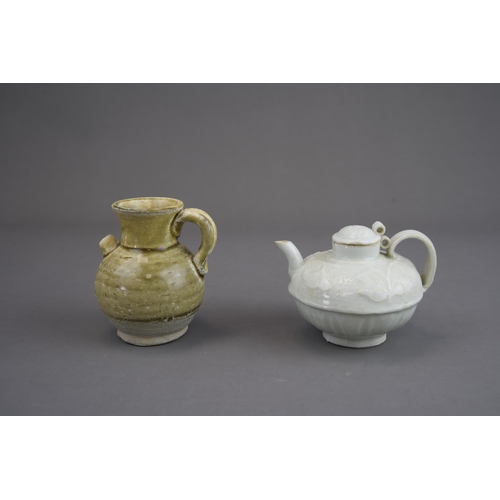 5 - A Qingbai Ewer and Cover and A Amber-glazed Ewer, Song dynasty and earlier Qingbai ewer with oval bo... 