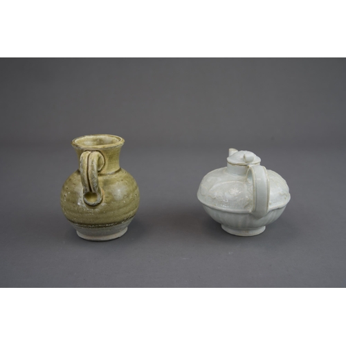 5 - A Qingbai Ewer and Cover and A Amber-glazed Ewer, Song dynasty and earlier Qingbai ewer with oval bo... 