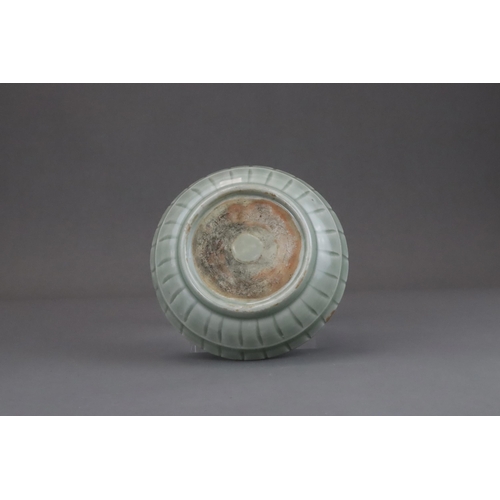 57 - A Longquan Celadon Washer, Yuan dynasty or later the shallow rounded sides divided into fluted lobes... 