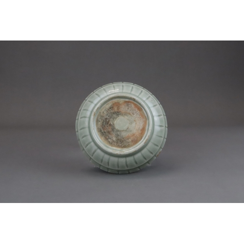 57 - A Longquan Celadon Washer, Yuan dynasty or later the shallow rounded sides divided into fluted lobes... 