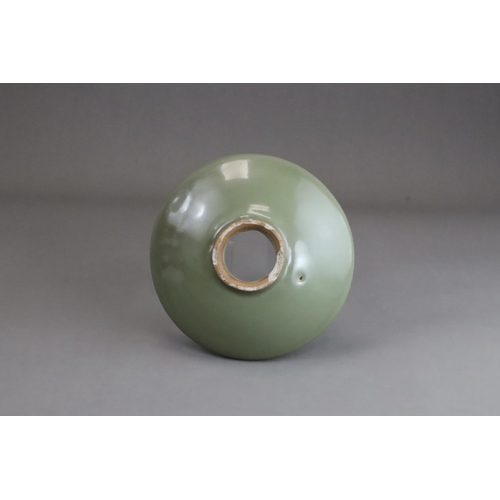 58 - A Longquan Celadon Cupstand, Ming dynasty with rounded sides resting on a thick short foot,with a ro... 