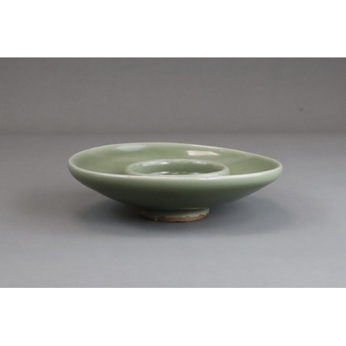 58 - A Longquan Celadon Cupstand, Ming dynasty with rounded sides resting on a thick short foot,with a ro... 