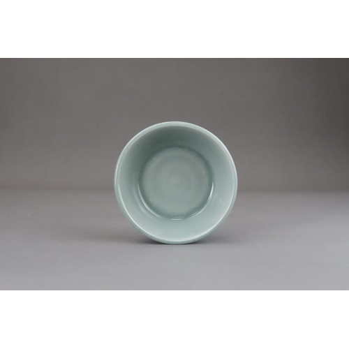 60 - A Longquan Celadon Brushwasher, Song dynasty with straight flared sides rising at an angle from a ta... 