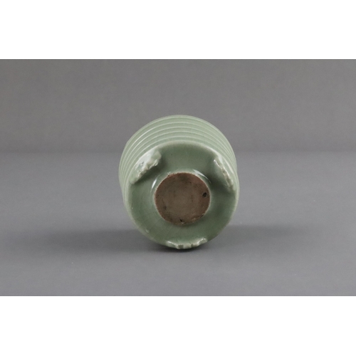 61 - A Longquan Celadon Tripod Incense Burner, Song/Yuan dynasty raised on three ruyi-feet, the exterior ... 