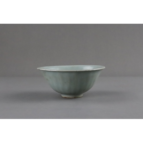 64 - A Longquan Celadon Lotus Bowl with stand, Song dynasty flaring from the short foot to the everted ri... 