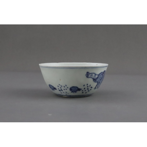 69 - A Blue and White Chicken Cup, Late Ming dynasty of circular shape, painted with a hen and six chicks... 