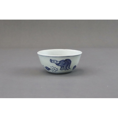 69 - A Blue and White Chicken Cup, Late Ming dynasty of circular shape, painted with a hen and six chicks... 