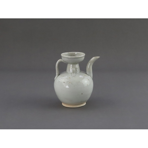 7 - A Qingbai Ewer, Song dynasty or later the globular lobed body rising to a tapering trumpet neck and ... 