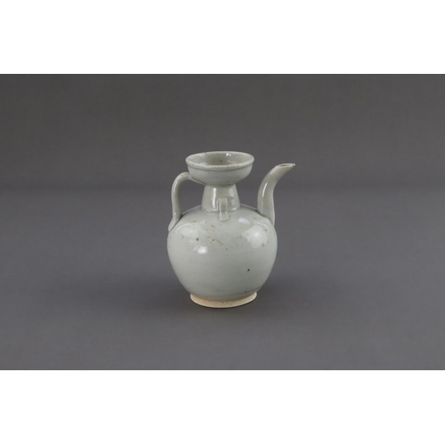 7 - A Qingbai Ewer, Song dynasty or later the globular lobed body rising to a tapering trumpet neck and ... 