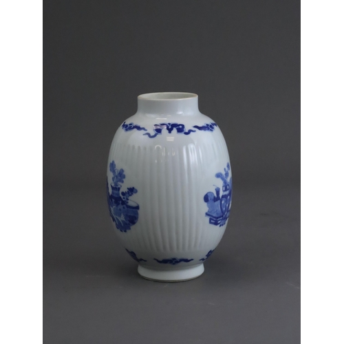 74 - A Blue and White Inscribed Jar, possibly Kangxi, of ovoid form, the fluted sides with three circular... 