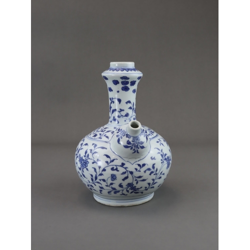 75 - A Rare Blue and White Kendi, Chongzhen, well painted in soft tones of blue with a continuous delicat... 