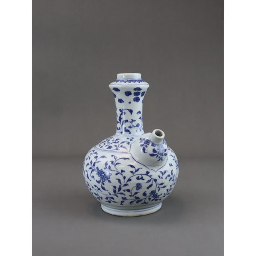 75 - A Rare Blue and White Kendi, Chongzhen, well painted in soft tones of blue with a continuous delicat... 