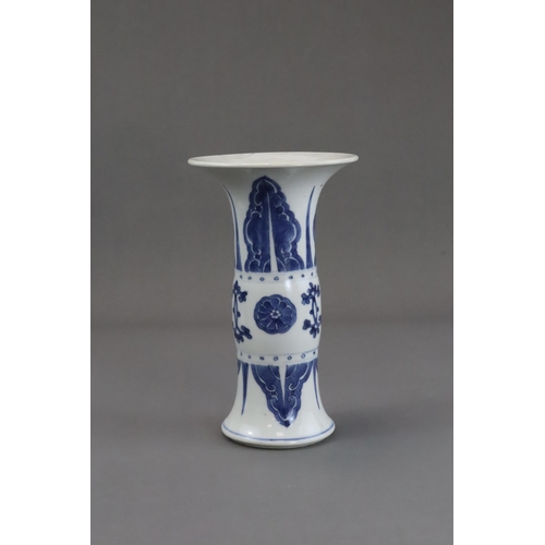 77 - A Blue and White Beaker Vase, Kangxi, the neck and lower body both painted with stylised plantain la... 