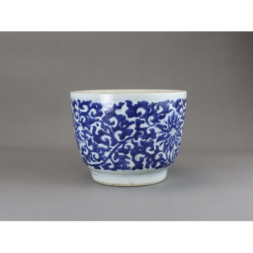 78 - A Blue and White Lotus Deep Bowl, Kangxi of rounded shape and tapering sides to straight foot, scrol... 