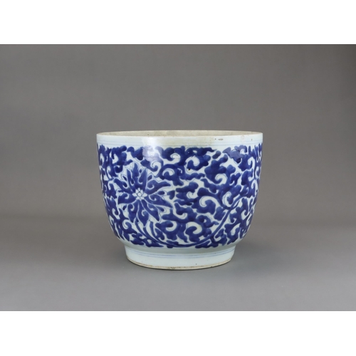 78 - A Blue and White Lotus Deep Bowl, Kangxi of rounded shape and tapering sides to straight foot, scrol... 