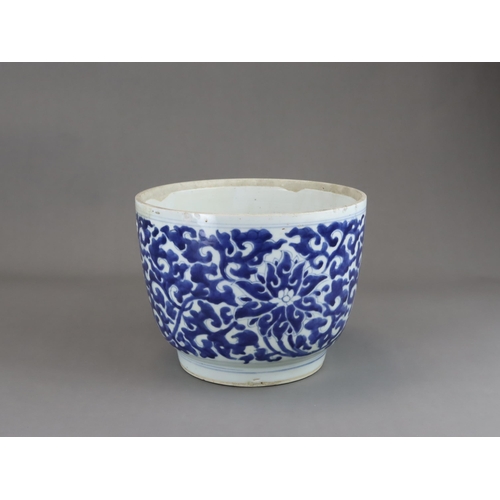 78 - A Blue and White Lotus Deep Bowl, Kangxi of rounded shape and tapering sides to straight foot, scrol... 