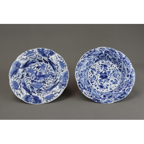 80 - Two Petal Moulded Blue and White Dishes, Kangxi, one with a Phoenix and peony central medallion, wit... 