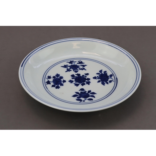 88 - A Blue and White Floral Dish, mark of Wanli but Kangxi period well painted in bright cobalt blue wit... 