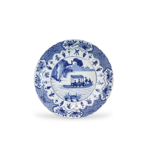 91 - A Blue and White 'Red Cliff' Dish, Kangxi, well painted in good blue with a central scene of boating... 