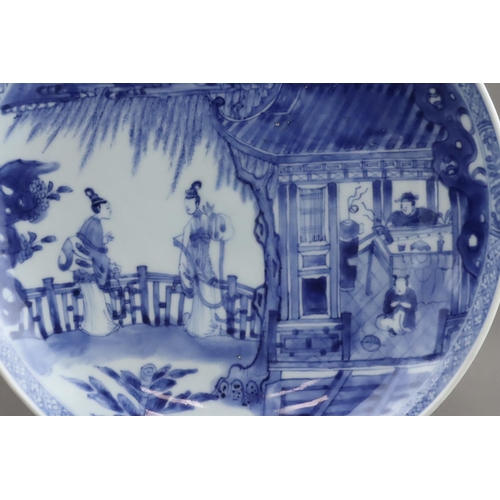 92 - A Blue and White Saucer Dish with Figures, Kangxi, well painted in good blue with a large central me... 