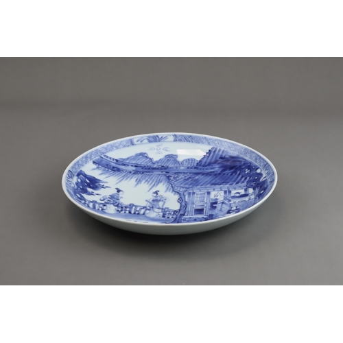 92 - A Blue and White Saucer Dish with Figures, Kangxi, well painted in good blue with a large central me... 