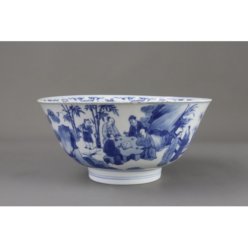 93 - A Blue and White Bowl with Scholars, six character Kangxi mark and of the period well painted in ric... 