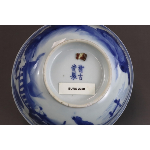 94 - A Good Blue and White Bowl with Figures, early Kangxi  painted on the exterior in strong blue with a... 