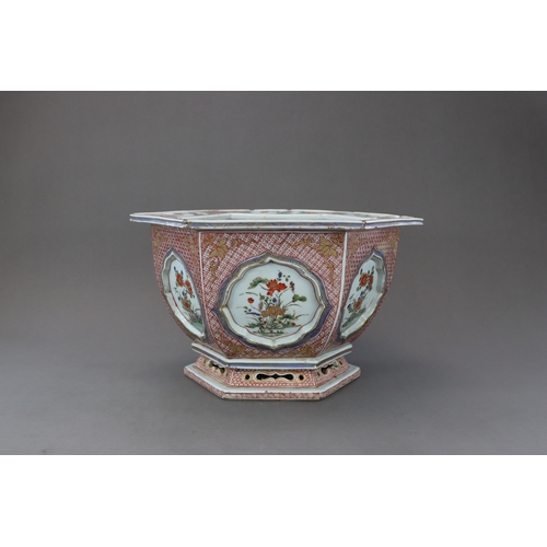 313 - A 'famille verte' Hexagonal Jardiniere, Kangxi, the rounded sides flaring from the waisted pierced f... 