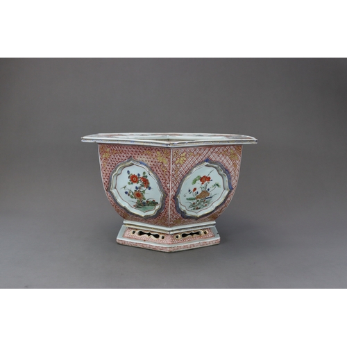 313 - A 'famille verte' Hexagonal Jardiniere, Kangxi, the rounded sides flaring from the waisted pierced f... 