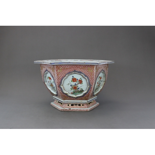 313 - A 'famille verte' Hexagonal Jardiniere, Kangxi, the rounded sides flaring from the waisted pierced f... 