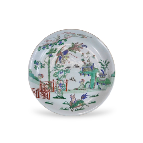 314 - A 'famille verte' Kylin and Phoenix Dish, Kangxi, brightly enamelled with an overall scene of the au... 