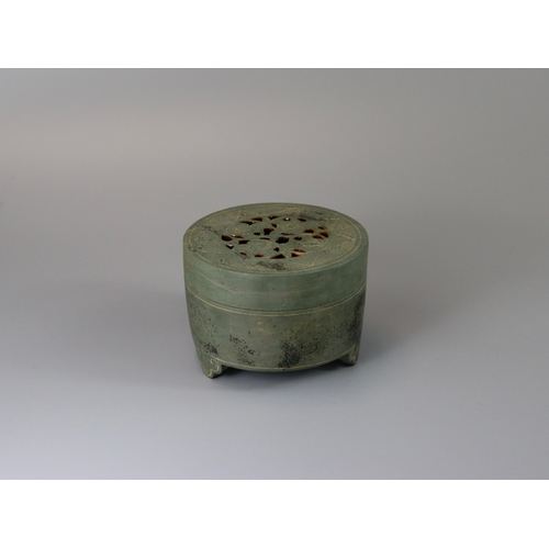 32 - A Rare Stone Cylindrical Tripod Incense Burner and Cover, Song dynasty the cover pierced with a scro... 