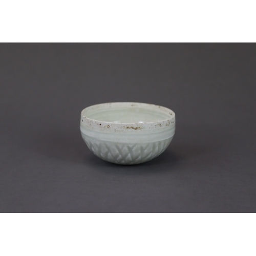 35 - A Qingbai Lotus Bowl, Song dynasty  the circular flat base rising to a straight rim, and carved on t... 