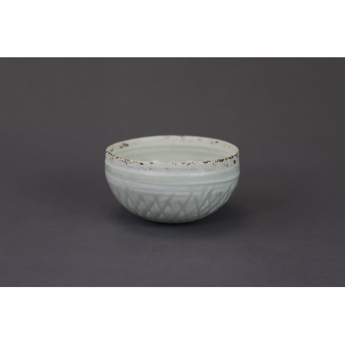 35 - A Qingbai Lotus Bowl, Song dynasty  the circular flat base rising to a straight rim, and carved on t... 