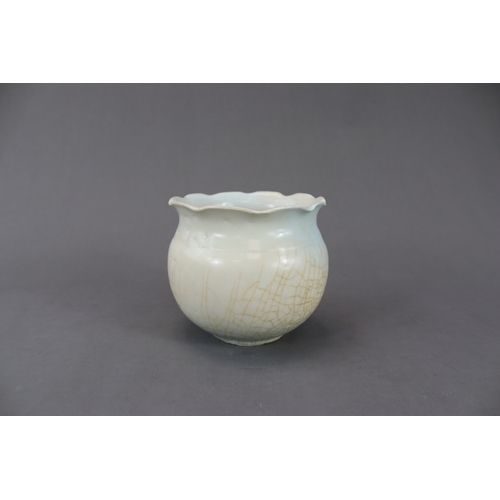 36 - A Qingbai Foliate-rim Jar, Song dynasty with short foot and globular body, rising to the waisted nec... 