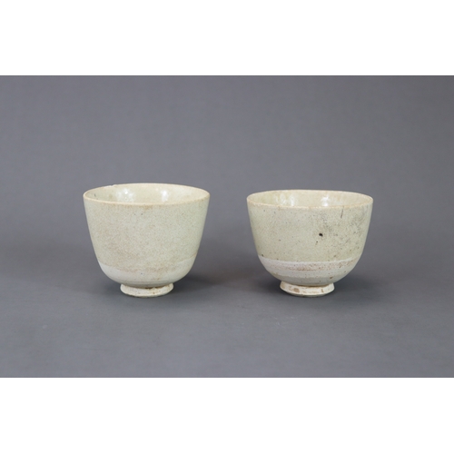 4 - A Pair of White-glazed Cups, Sui dynasty with thinly potted deep sides flaring slightly towards the ... 