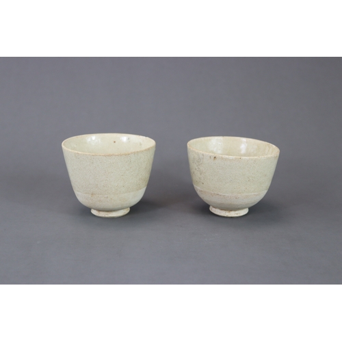 4 - A Pair of White-glazed Cups, Sui dynasty with thinly potted deep sides flaring slightly towards the ... 