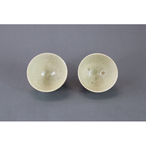 4 - A Pair of White-glazed Cups, Sui dynasty with thinly potted deep sides flaring slightly towards the ... 