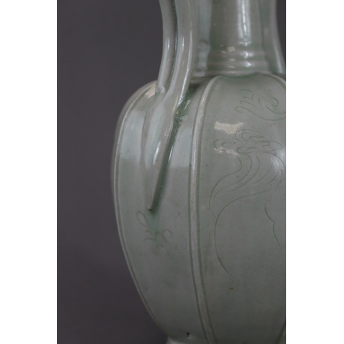 40 - An Extremely Rare Yue-type Incised Ewer, Five dynasties/Northern Song dynasty the melon-shaped body ... 